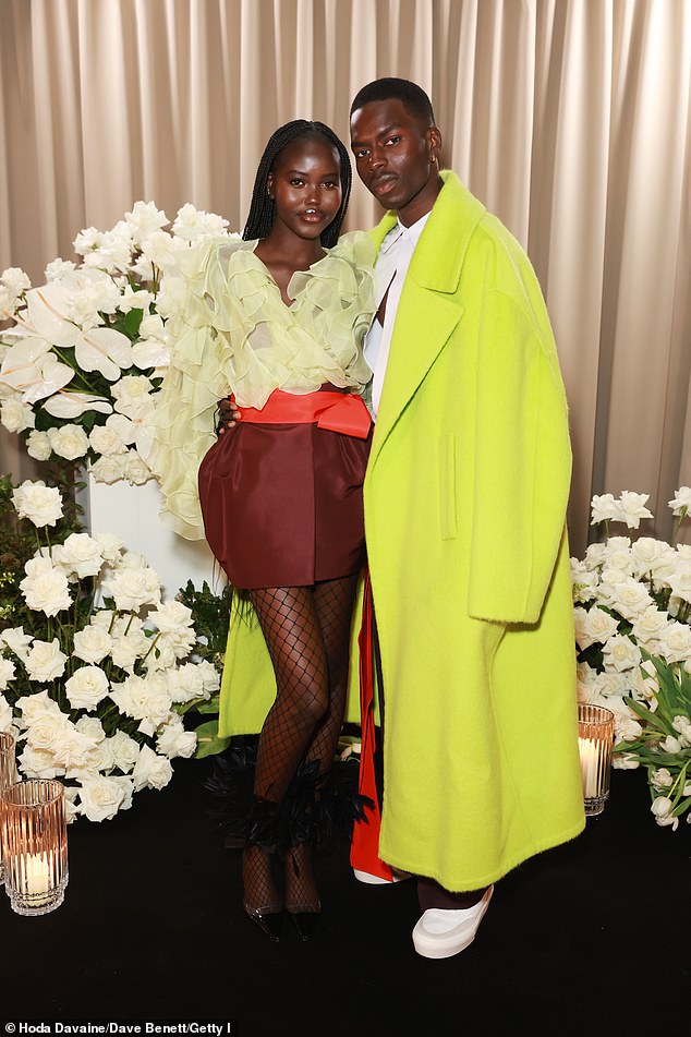 Adut Akech and Samuel Elkhier at a Vogue 2022 fashion event