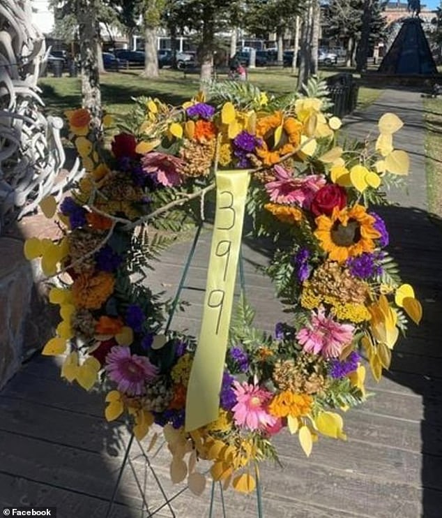 Heartbroken fans have gone to the crash site at mile marker 126 in the Snake River Canyon in western Wyoming to set up memorials and leave flowers in the grizzly's honor.