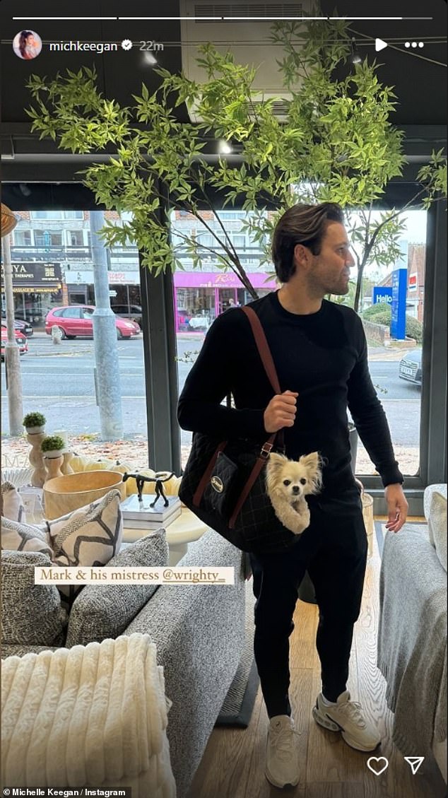 The actress, 37, poked fun at her partner when she posted a photo of him carrying their small dog sticking out of their travel bag