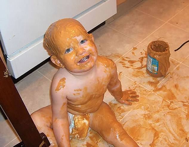 Tasty! For one toddler, peanut butter was so delicious that the only logical thing to do was to cover his entire face and body with it