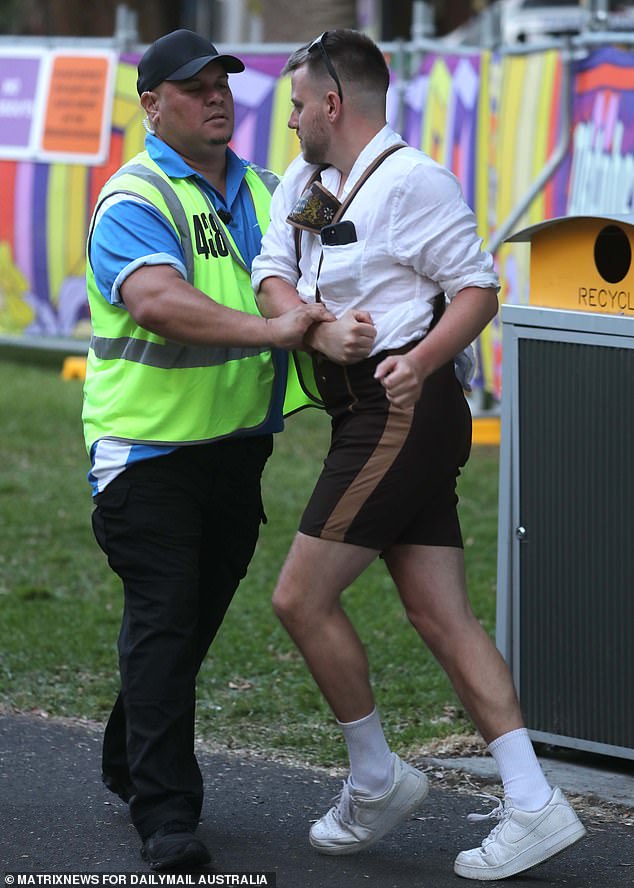 One festival-goer tried to lead a security guard in a German folk dance