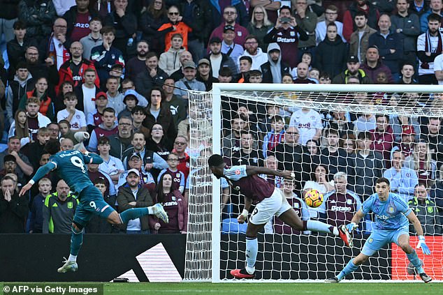 Evanilson (left) headed his side level in the 96th minute to earn a 1-1 draw at Villa Park