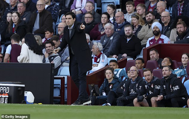 Bournemouth boss Andoni Iraola photographed how he managed his players during the match at Villa Park