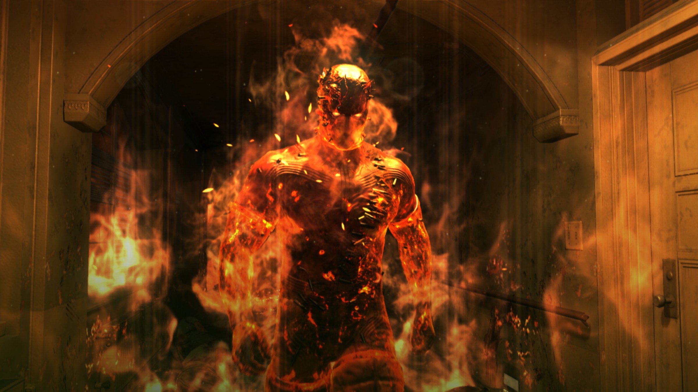 A masked man with glowing eyes and a body covered in flames and bullets in Metal Gear Solid 5: The Phantom Pain.