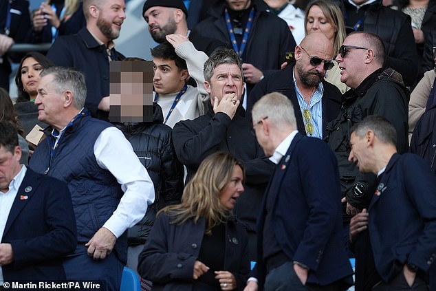 He was accompanied by his 17-year-old son, who was seen in the stands watching the match intently with his father