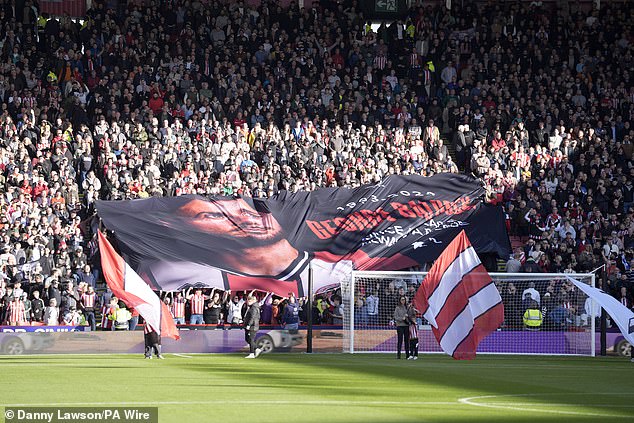 Sheffield United supporters unfurled a banner in honor of the defender, who made more than 200 appearances for the club