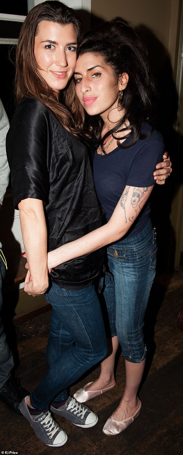 Isabelle Thomas, who committed suicide on Monday, is pictured with Amy Winehouse at a party in London in 2010. Winehouse died of an accidental overdose in July 2011 at the age of 27.