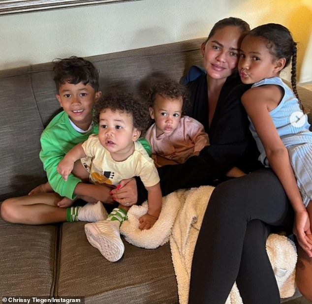 Chrissy and John share Luna, Miles, Esti and Wren – who was born via surrogate in June 2023