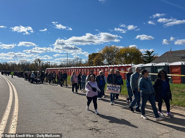 A long line of Harris supporters waited to attend her rally with Michelle Obama in Kalamazoo, MI on Saturday