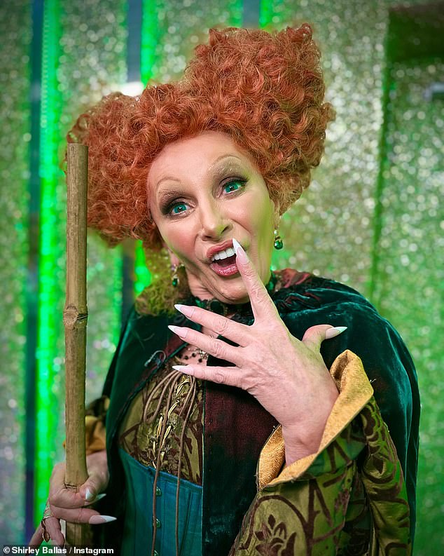 Shirley looked fantastic as she rocked the striking witch outfit complete with the iconic orange wig