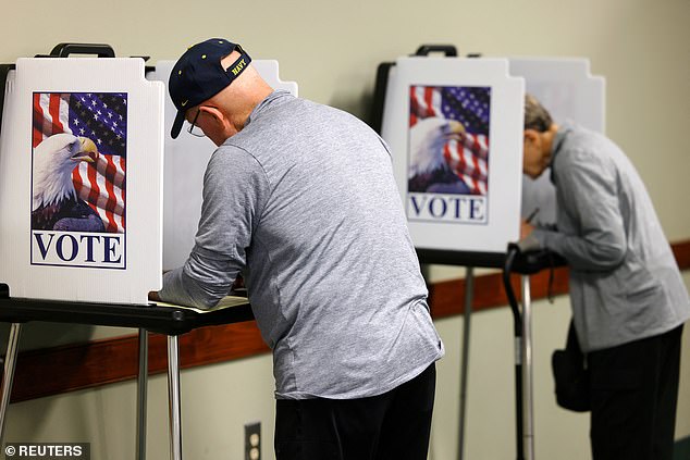 Voters participating in early voting in the 2024 election in Greensboro, NC. More than 33 million people have already cast their votes for the elections, including early voting and voting by mail