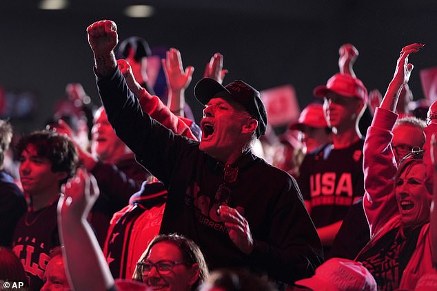 Attendees cheered as Trump ripped Kamala Harris and said he would make the auto industry great again