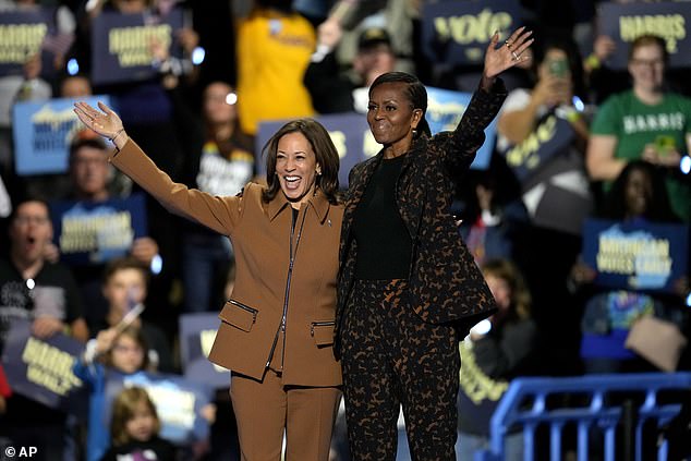 Harris with Obama at the Wings Event Center. The former first lady questioned why Harris is being held to a higher standard than Trump and praised her as ready to meet the moment