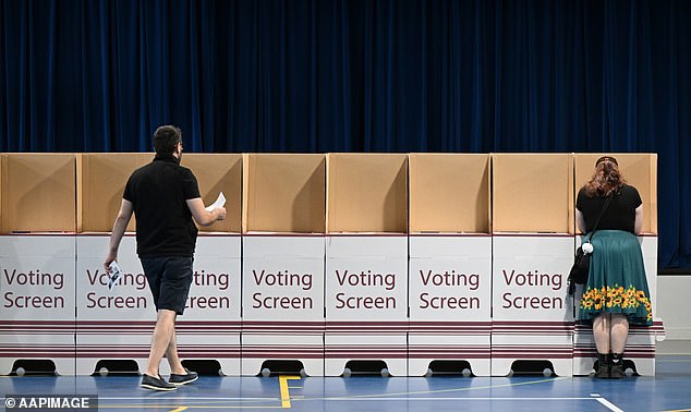 Queensland voters were seen at a polling booth at Kallangur State School in Brisbane on Saturday