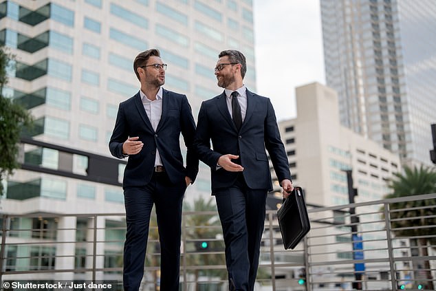 Many men who are spectacularly successful, both sexually and professionally, are considered ugly (stock photo of business people)