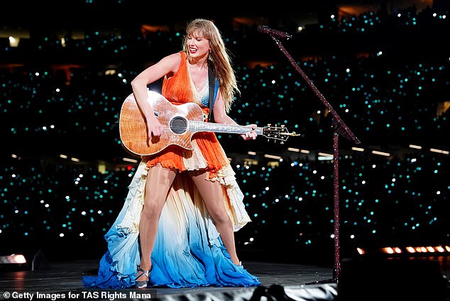 Taylor also debuted a gorgeous new koi fish-inspired dress during her surprise song on Saturday night