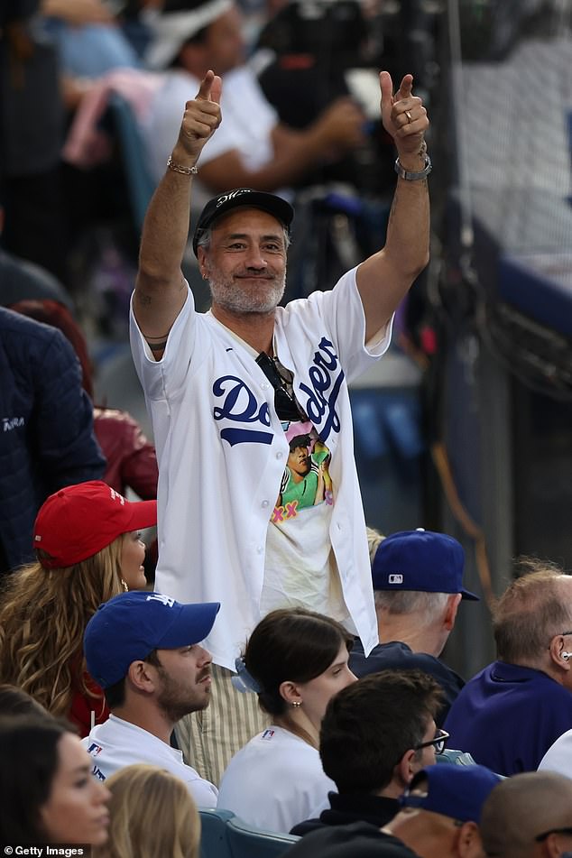 The Jojo Rabbit filmmaker was dressed from head to toe in Dodgers merchandise for the showdown