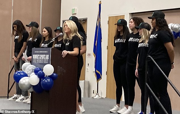 At a news conference, the tearful captain blasted the university for ignoring the team's concerns about sharing the court with a transgender athlete.