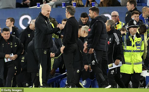 Everton manager Sean Dyche shakes hands with Fulham boss Marco Silva at full-time