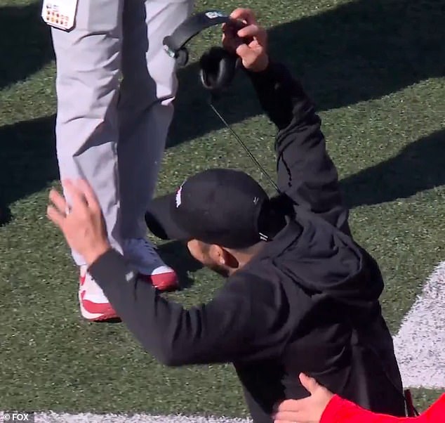 Day slammed his headset on the ground after the call, ejecting Arvell Reese