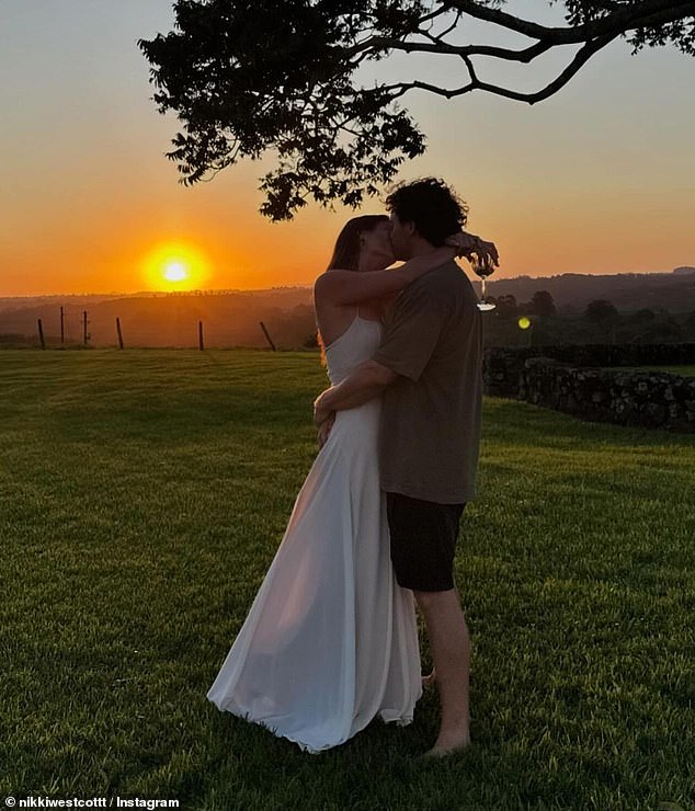 The couple looked very much in love as they shared a romantic kiss in front of the sunset just hours before their wedding