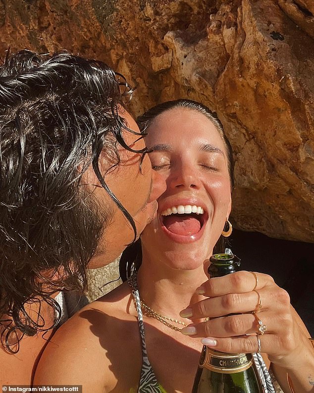 Nikki shared the news on Instagram at the time, proudly showing off her diamond sparkler after Oli got down on one knee during a low-key but romantic beach proposal