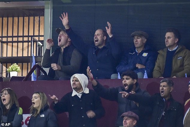 Prince William, second left in the back row, isn't afraid to let loose during the opening Champions League match between his team Aston Villa and Bayern Munich earlier this month