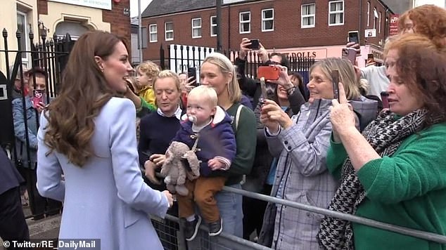 An Irish nationalist confronts Kate while walking in North Belfast in 2022