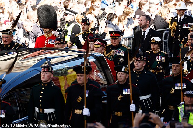 A man argues with Prince Andrew as he walked behind the late Queen's coffin in Edinburgh in 2022