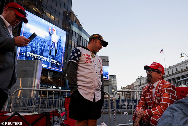 Diehard MAGA fans camped out just outside the stadium early Sunday