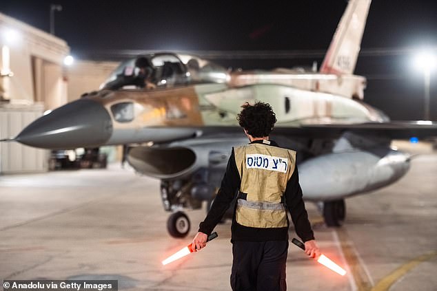 A view of a fighter jet being prepared ahead of the Israeli army's attack on Iran, on October 26, 2024 in Israel