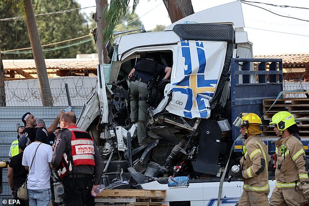 Israeli police investigate the scene of a truck ramming outside the Glilot military base near Tel Aviv, Israel, October 27, 2024