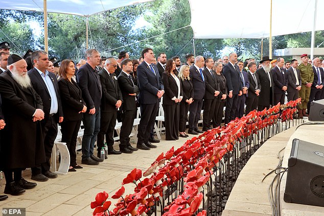 Officials attend a commemoration ceremony marking the one-year anniversary of the Hamas attack that sparked the ongoing war in Gaza on the Hebrew calendar, at the Mount Herzl Military Cemetery in Jerusalem, October 27, 2024