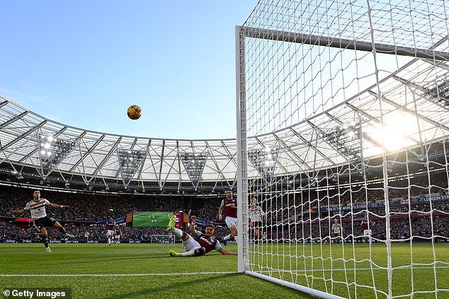 But despite being in front of an open goal, Dalot could only lift his effort over the bar