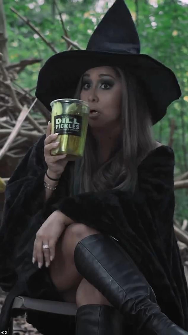 Nicole 'Snooki' Polizzi as the 'Pickle Witch' in Jimmy John's promo, which breaks the news. The pickle-loving star drank pickle juice in the video (pictured)