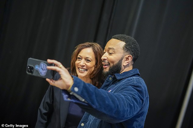 Kamala Harris takes a selfie with John Legend ahead of her rally in Philadelphia