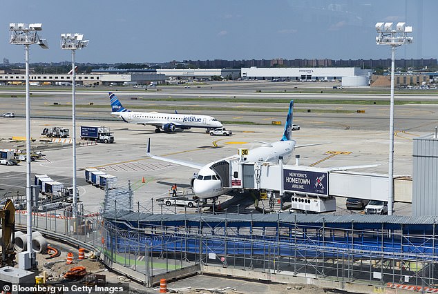 JetBlue aircraft are pictured at JFK Airport on Sunday, July 23, 2023