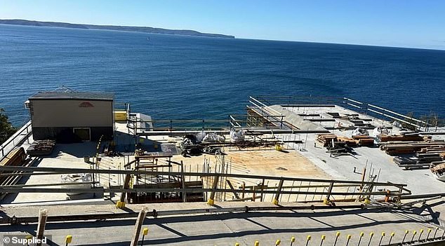 An upset local resident exclusively told Daily Mail Australia that they were fed up with the ongoing project, which they have nicknamed 'the Taj Mahal of Whale Beach'. In the photo: the construction site on the beach