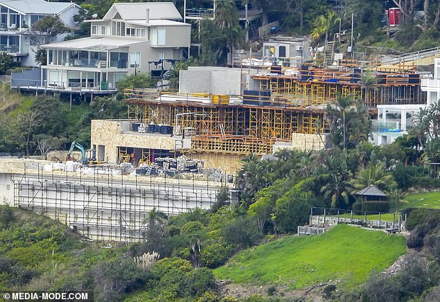 The original 1950s house was demolished to make way for a modern multi-story mansion, including a basketball court, swimming pool and large garage. Pictured in May