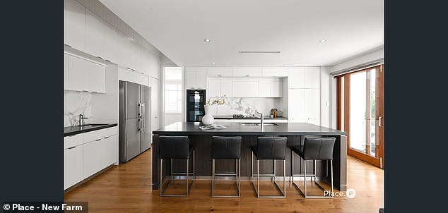 Although the property is a classic 1920s Queensland, it has plenty of modern conveniences, including this luxury kitchen