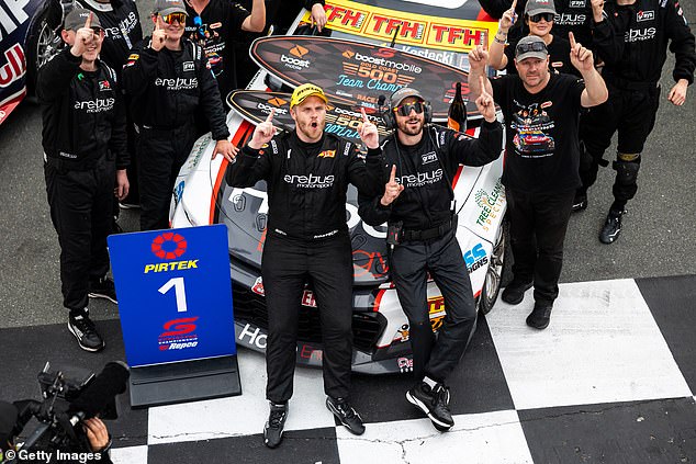 Brodie Kostecki (front, wearing yellow cap) celebrates after taking a race win on the Gold Coast last weekend