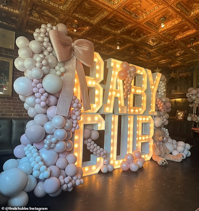 Dusty pinks and mauves filled the baby shower venue, as did flowers from Dearest Rachel and a display from Balloon Thrill