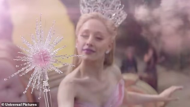 Glinda Upland waves her magical wand more than once in the clip