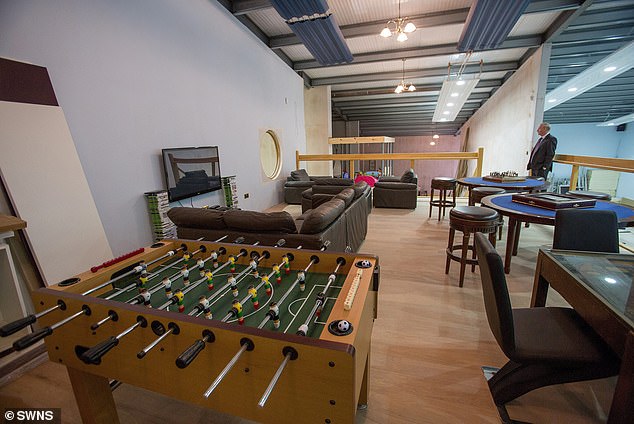 In addition to a comfortable seating area, Mr. Wildin's spectacular man cave had room for a foosball table