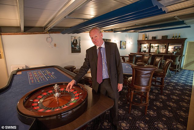 Mr. Wildin's man cave also included a casino complete with a roulette wheel and its own bar