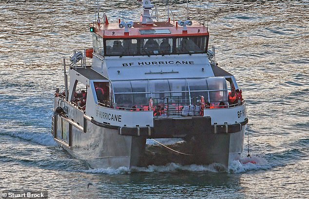 Border Force officers escort migrants to Dover Docks in Kent, United Kingdom on October 25, 2024