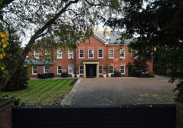 The mansion features three lounges, a home cinema, an indoor swimming pool, a landscaped garden and is located on one of Merseyside's most expensive roads