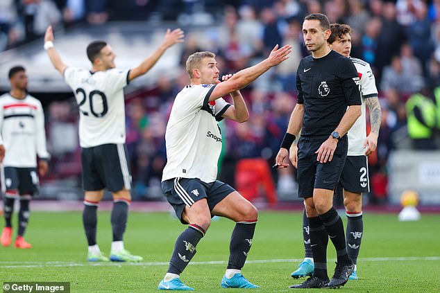 Man United defender Matthijs de Ligt (centre) was adjudged to have made a foul in the penalty area