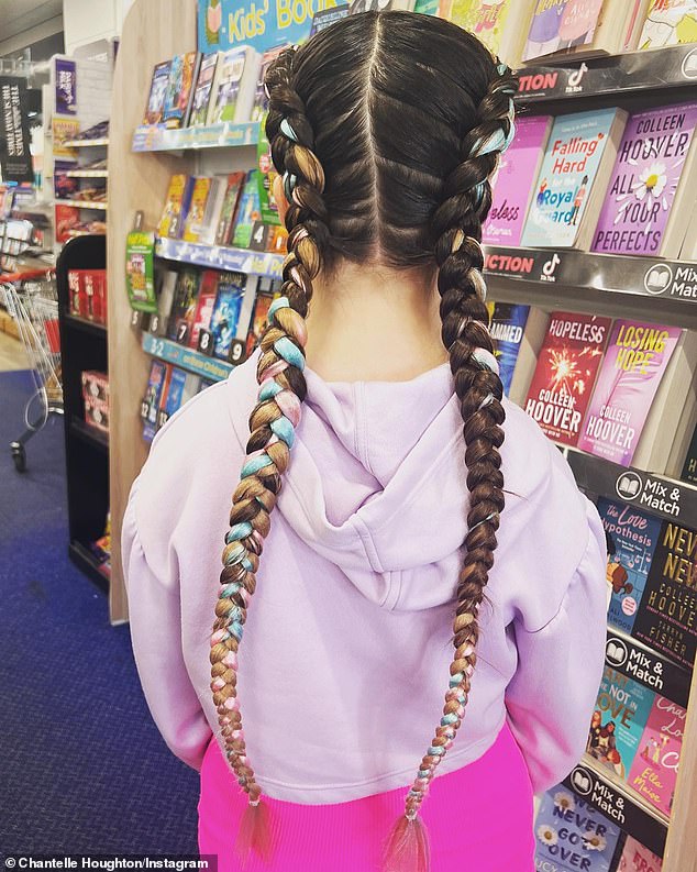 She previously shared a photo of the back of Dolly's head in October 2023, showing off the girl's colorful braids