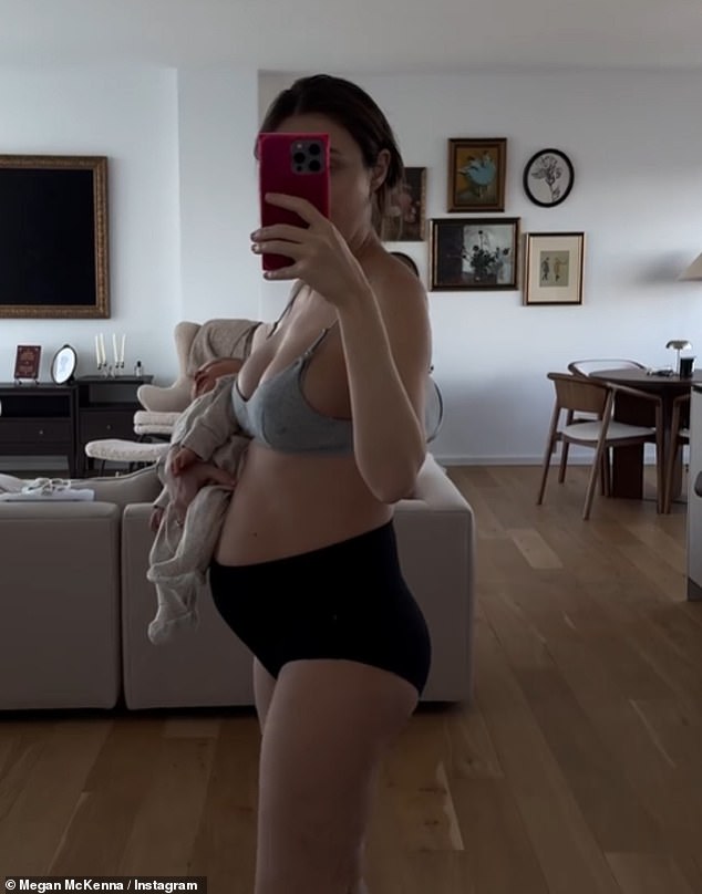 In a second snap, Megan showed off her postpartum figure as she posed for a mirror selfie in a gray bra and black pants while holding her son